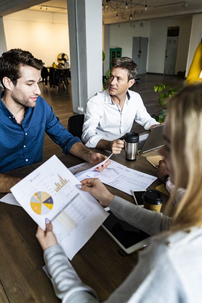 business team having a meeting in loft office 2022 12 16 22 31 45 utc min scaled